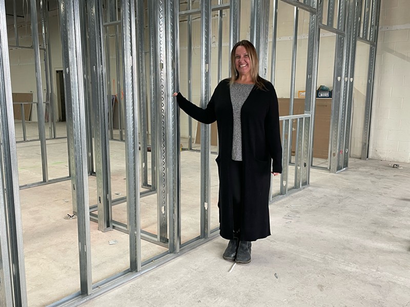Canine to Five owner Liz Blondy at the construction site for her newest location in Jefferson Chalmers. - Courtesy photo