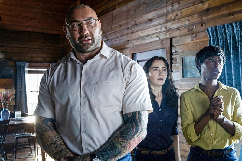 Dave Bautista, left, in Knock at the Cabin by M. Night Shyamalan. - Universal Studios