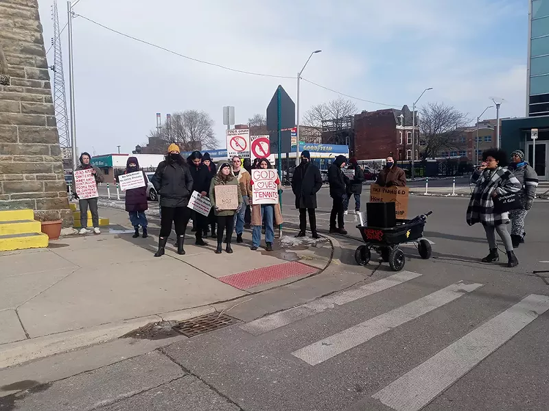 Sammie Lewis (far right), a community organizer with Detroit Eviction Defense, helped lead a rally for renters on Sunday. - Eleanore Catolico