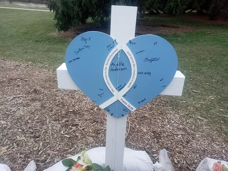 One of the white crosses honoring one of the students killed, Arielle Diamond Anderson. She dreamed of becoming a doctor. - Eleanore Catolico