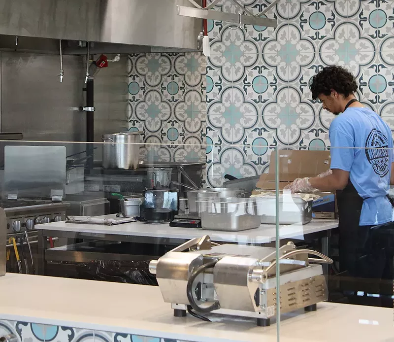 A worker at a Ori’Zaba’s Scratch Mexican Grill restaurant. - Courtesy photo