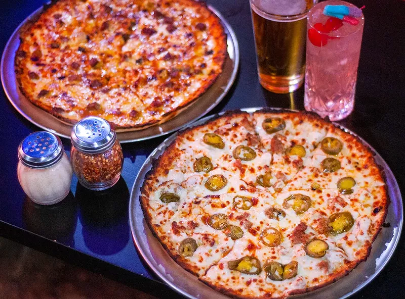 The Carolina brisket and Little Caligula pies from Greektown’s Pizza Cat Max. - Tom Perkins