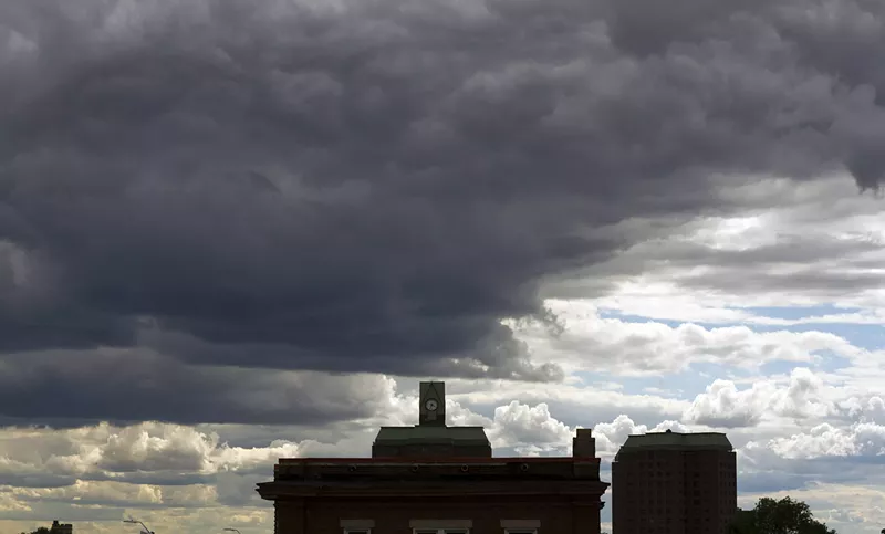 Clouds hang over Detroit near the Cass Corridor. - Steve Neavling
