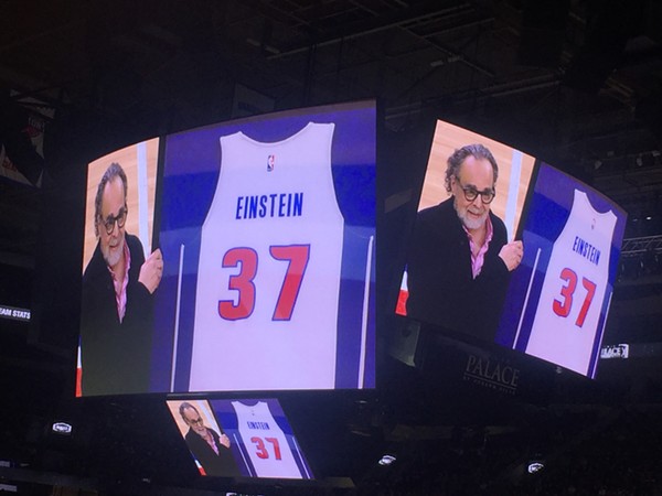 Pistons photographer Allen Einstein is honored at the Palace of Auburn Hills on April 5 with a jersey commemorating his 37 years with the team.