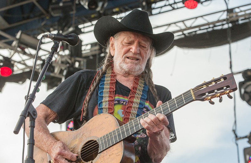 Willie Nelson performing in 2014. - Shutterstock