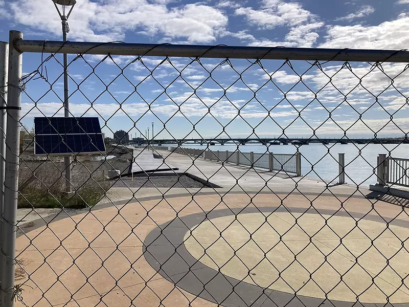 Looking east from Mt. Elliott Park toward Belle Isle’s MacArthur Bridge. Behind the fence is a promenade on the former Uniroyal site that will connect downtown to Belle. - Joe Lapointe
