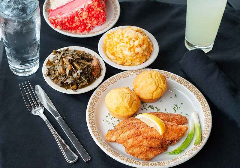 Catfish dinner with collards, mac and cheese, and cake. - Tom Perkins