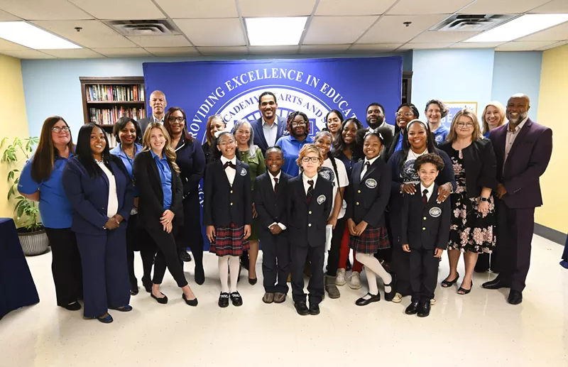 Detroit Academy of Arts & Sciences students and faculty at a news conference Thursday. - Jose Juarez