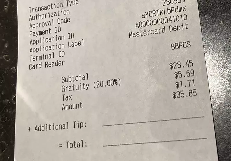 Buddy’s Pizza in downtown Detroit adds a 20% gratuity to the bill. - Joe Lapointe