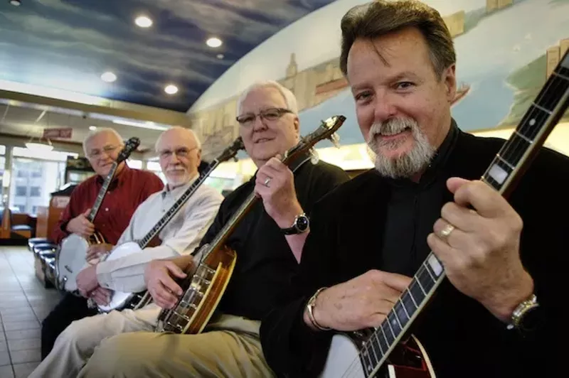 Who's that pickin' and a-grinnin'? It's the NAIBC Steering Committee! Left to right, it's John Smith, Bob Ervin, Richard Shinske, and Brian Newsom. - Photo courtesy NAIBC
