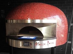 Press Room's pizza oven. - Instagram