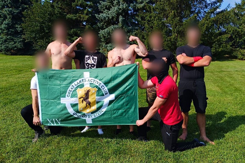 Members of the neofascist Great Lakes Active Club pose with their faces blurred at an undisclosed location. - Telegram/Great Lakes Active Club