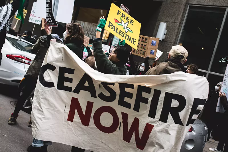 Protesters call for a ceasefire at Sen. Debbie Stabenow’s Detroit office. - Viola Klocko