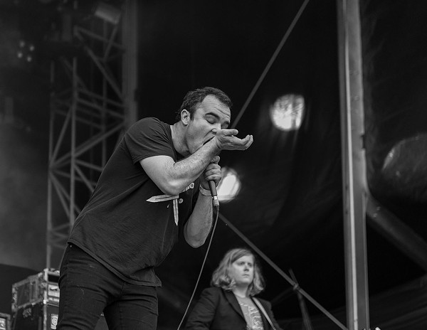 FUTURE ISLANDS PERFORM LIVE IN 2015. PHOTO FROM WIKIPEDIA.