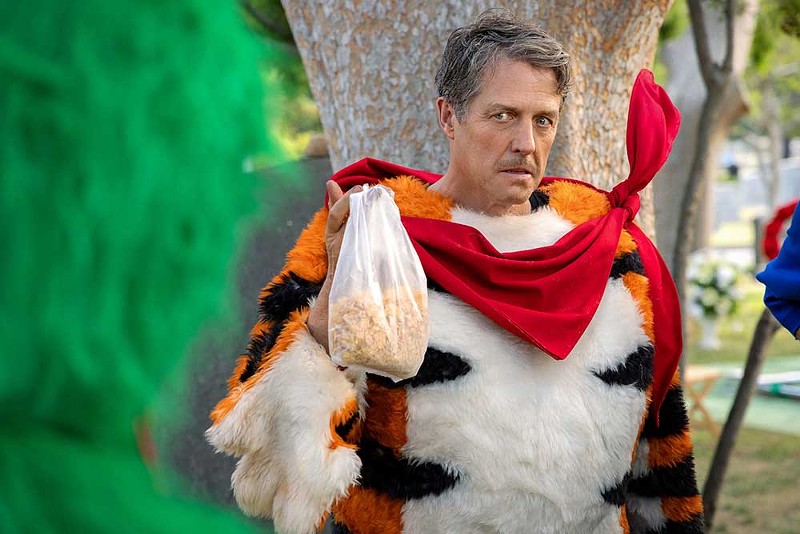 Hugh Grant stars in Unfrosted as the actor behind Tony the Tiger. - Courtesy of Netflix