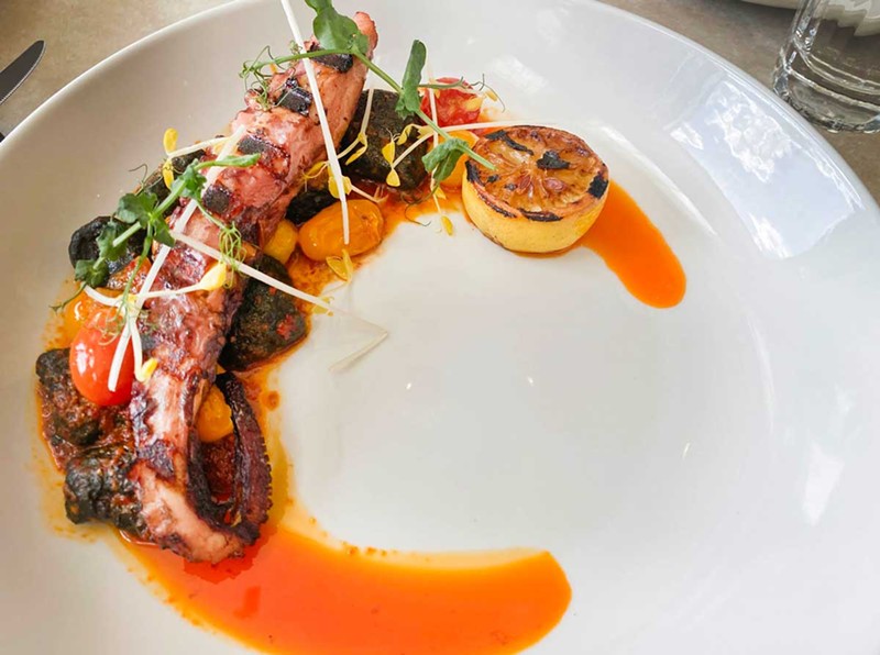 The octopus at Cibo is cooked sous vide, then pan-cooked in olive oil, then grilled, rendering the notoriously tough mollusk tender. - Tom Perkins