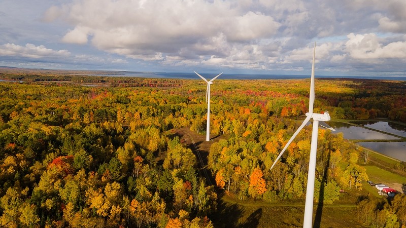 Two towering wind turbines provide clean energy near Mackinaw City in Michigan. - Shutterstock