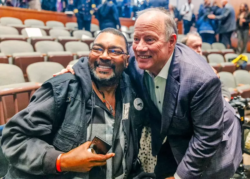 Community activist Malik Shabazz with Mayor Mike Duggan last week. - Courtesy