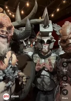 Gwar breaks the news to Mark Paul's friends. - Screenshot via Cameo