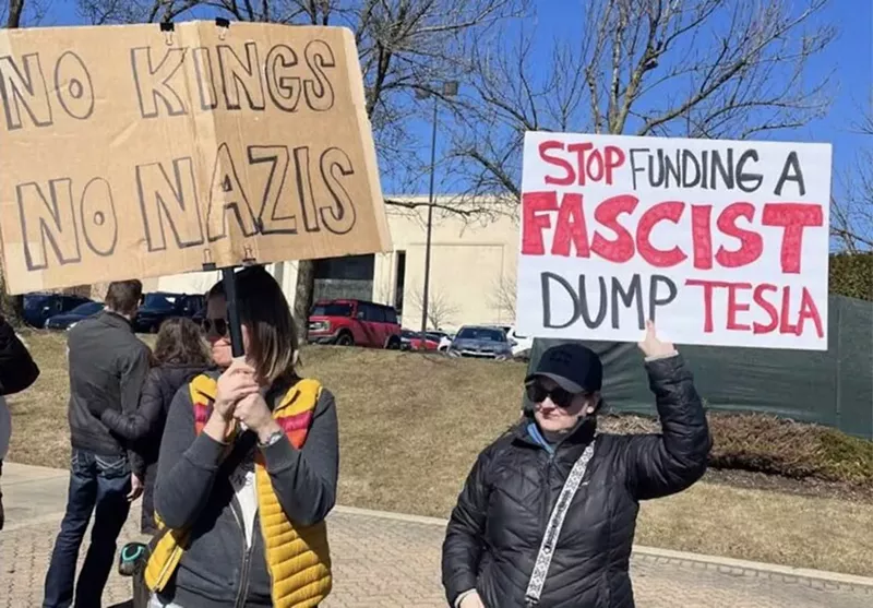 “Tesla Takedown” protesters gather outside the Somerset Collection in Troy. - Peter Werbe