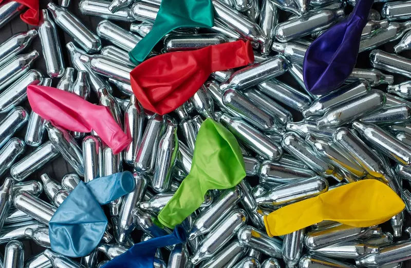 Michigan health officials are warning about a significant increase in nitrous oxide-related emergencies. - Shutterstock