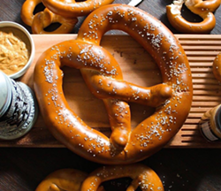 A giant pretzel at Curtain Call - Cori D/Yelp