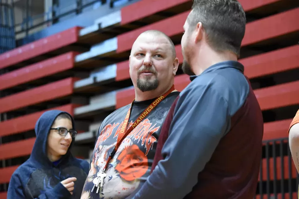 Brent Harvey (left) is one of the main promoters of female wrestling in Michigan. - Rachel Timlin