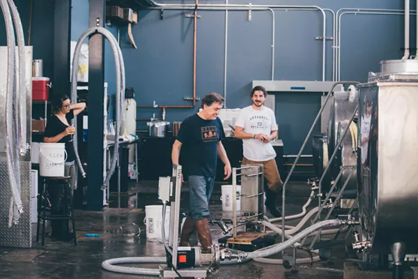 Co-owners Zach Typinski, Scott O'Keefe, and Mary Typinski at work in Urbanrest. - Rational Gaze Photography