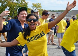University of Michigan football fans enter the stadium before the BYU game on September 26, 2015. - Shutterstock