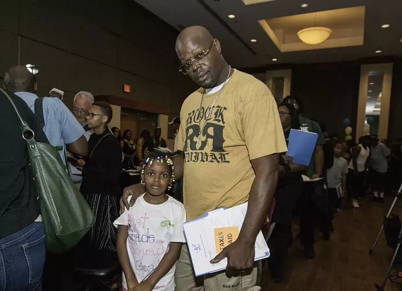 A participant of Detroit's new occupied buy-back program for foreclosed homes owned by the Detroit Land Bank Authority. - K.Shabu CCSD/City of Detroit