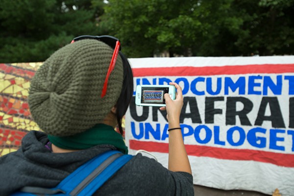 People protest President Donald Trump's announcement to end the Deferred Action for Childhood Arrivals program at a "Defend DACA" rally in Clark Park in Southwest Detroit on Tuesday, Sept. 5. - NICK HAYES