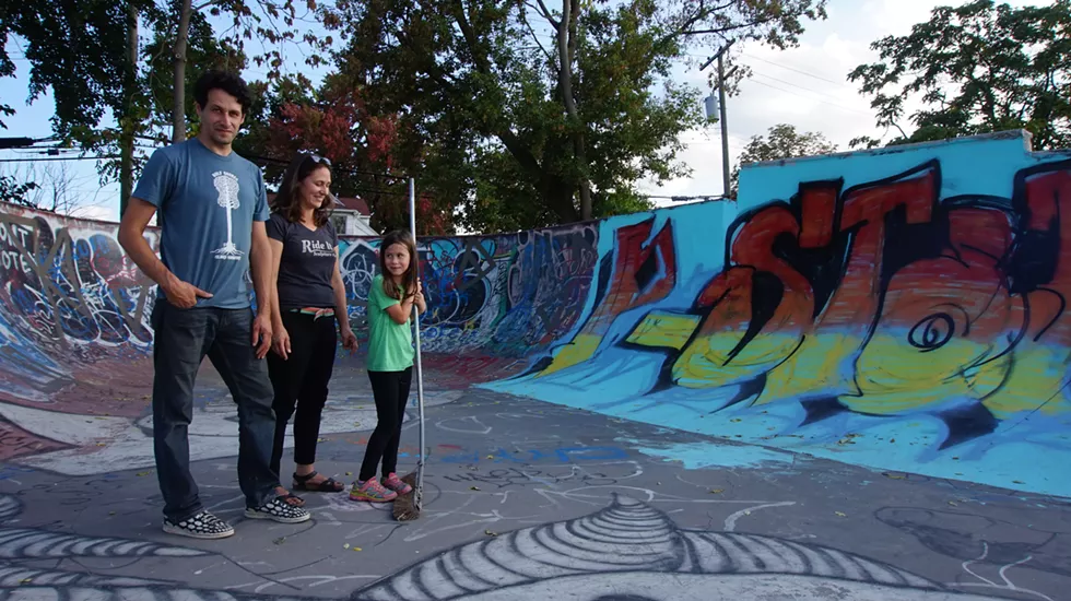 Mitch Cope, Gina Reichert, and their daughter at Ride It Sculpture Park. - Jane Fader
