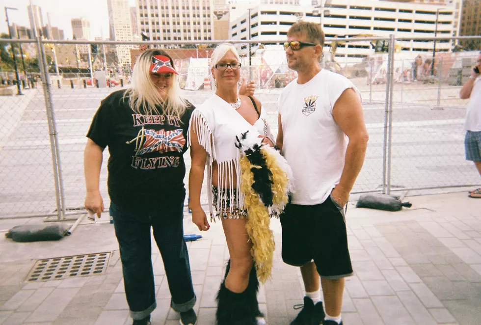 Kid Rock fans wearing the Confederate flag. - Lee DeVito