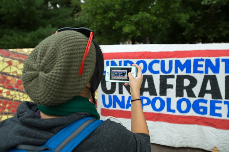 People protest President Donald Trump's announcement to end the Deferred Action for Childhood Arrivals program at a "Defend DACA" rally in Clark Park in Southwest Detroit on Tuesday, Sept. 5. - Nick Hayes
