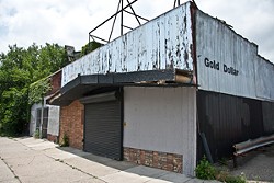 The Gold Dollar bar was quietly purchased in Ilitch-related development, recently released documents reveal