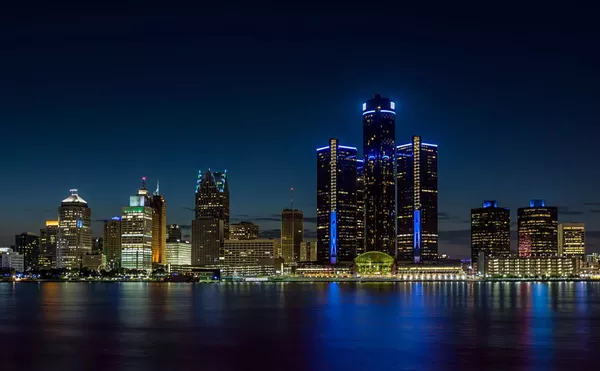 Detroit, Michigan skyline at night shot from Windsor, Ontario.