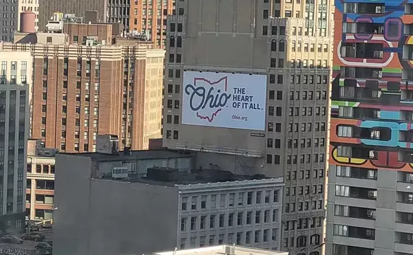 A billboard in Detroit promoting travel to Ohio.