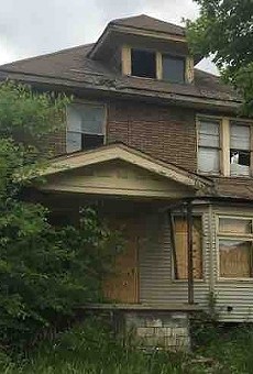 A blighted house owned by the Detroit Land Bank Authority.
