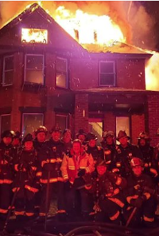Detroit firefighters may face discipline after posing in front of burning house