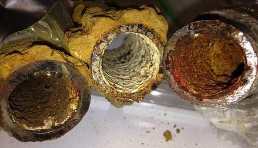 Photo of Flint drinking water pipes showing different kinds of iron corrosion and rust. - PHOTO COURTESY MIN TANG AND KELSEY PIEPER/VIRGINIA TECH