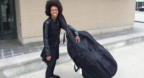 Robotics expert and upright bass player Zwena Gray will be just part of the all-female musical entertainment. - PHOTO COURTESY IWDC