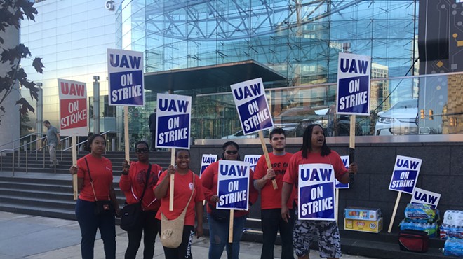 Workers on strike outside of GM's Detroit headquarters.