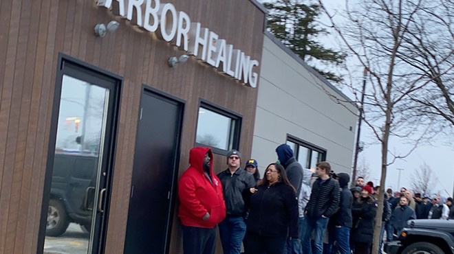 People lined up to buy recreational cannabis at Ann Arbor Healing, one of the first stores to be granted a license to sell.