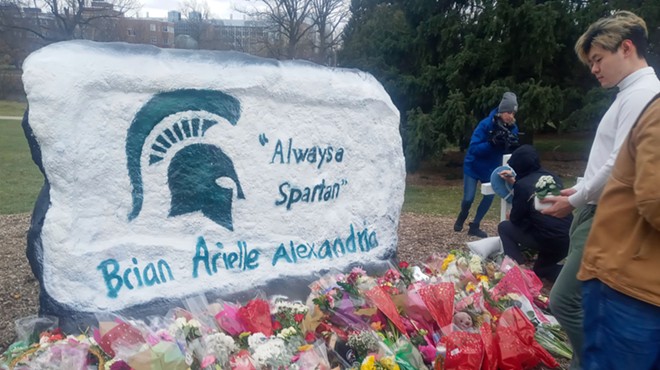 At Michigan State, survivors of a mass shooting walk in silence, mourn