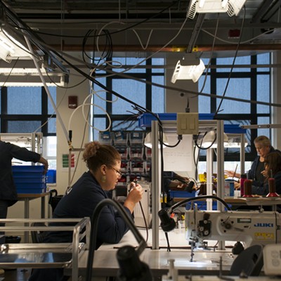 Employees at Shinola's New Center leather factory, located in a former GM design lab.