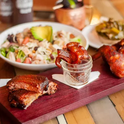 BBQ trio with turkey salad and greens.