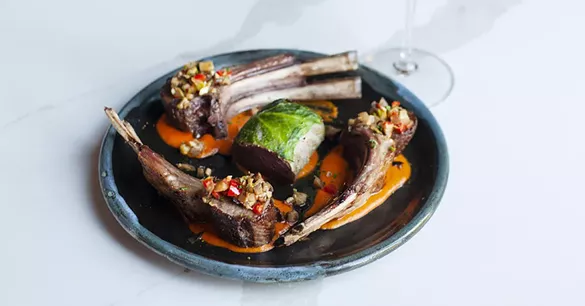 Lamb chops at Bar Pigalle in Detroit’s Brush Park

2915 John R Rd., Detroit; 313-497-9200; barpigalle.com


On this “playful French” menu — meaning Day-twah French, with license to invent — a star on the star-studded meat-centric menu is two umami-laden lamb chops with a crisp exterior plus a tenderloin wrapped in Savoy cabbage. They come with ratatouille and a creamy sauce made with sweet piquillo peppers. As a bonus, the French wines are affordable and there is no snooty-French-waiter vibe at all. (Read more in our review.) —Jane Slaughter