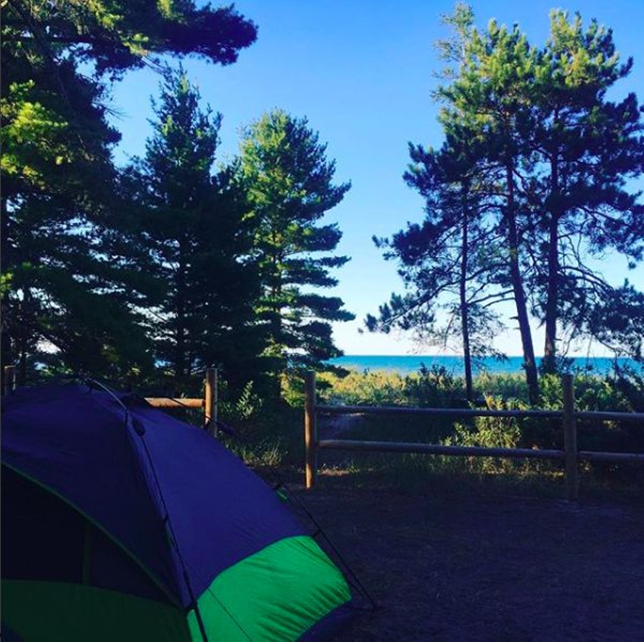 Ossineke State Forest Campground
Ossineke, MI
This rustic campground is a hidden gem spread out along the shore of Lake Huron. Set up camp among the trees, go for a hike on the mile-long trail in the park and then take the boardwalk out to the beach to end your day watching the sunset over the lake. 
Photo via IG user @pamfossett