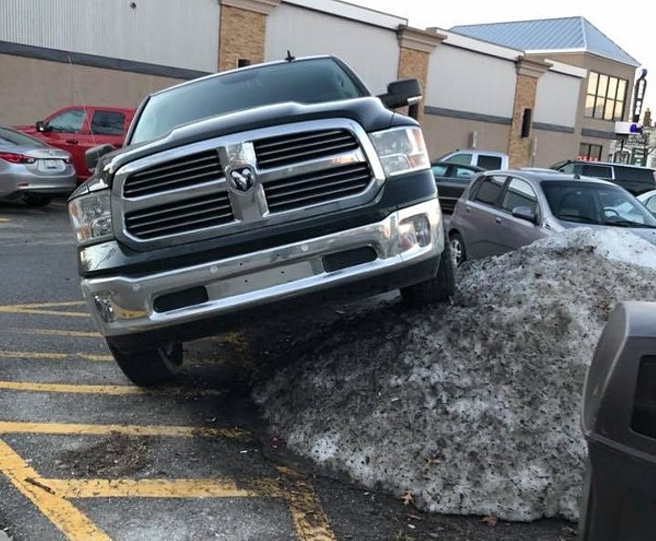  Parking spaces become snow banks  
The plow trucks have to pile the snow somewhere, giving us less parking spaces but more mounds of snow. If we need to climb the highest mountain of snow to park, then so be it. 
MT file photo 