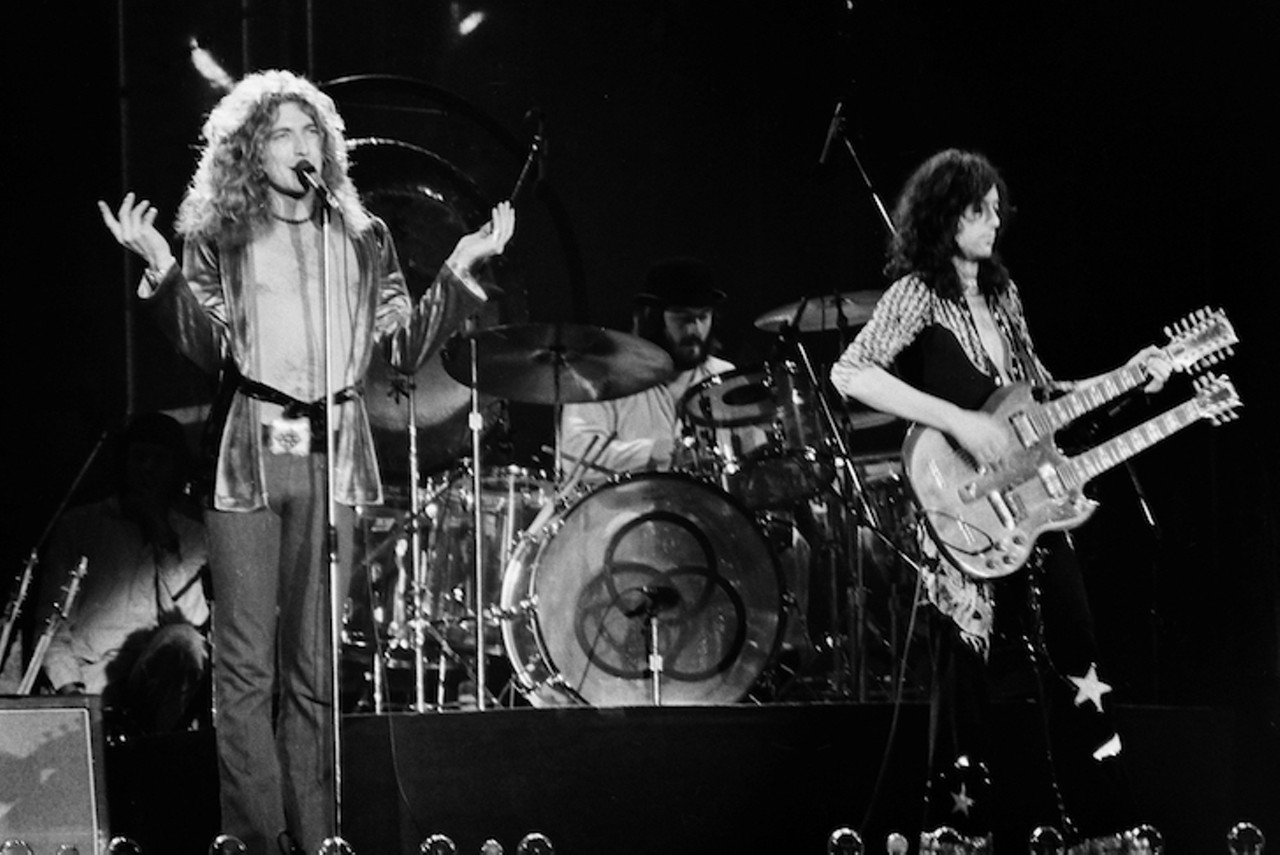 Led Zeppelin at Pontiac Silverdome
April 30, 1977
Just a year and a half after The Who set the record for the largest indoor concert ever, Led Zeppelin came to town and brought over 76,000 fans into the Pontiac Silverdome to break the record. Guitarist Jimmy Page told a Detroit radio station in 2014 that playing in the airlocked stadium was like something out of 2001: A Space Odyssey. 
Photo by Bruce Alan Bennett/Shutterstock